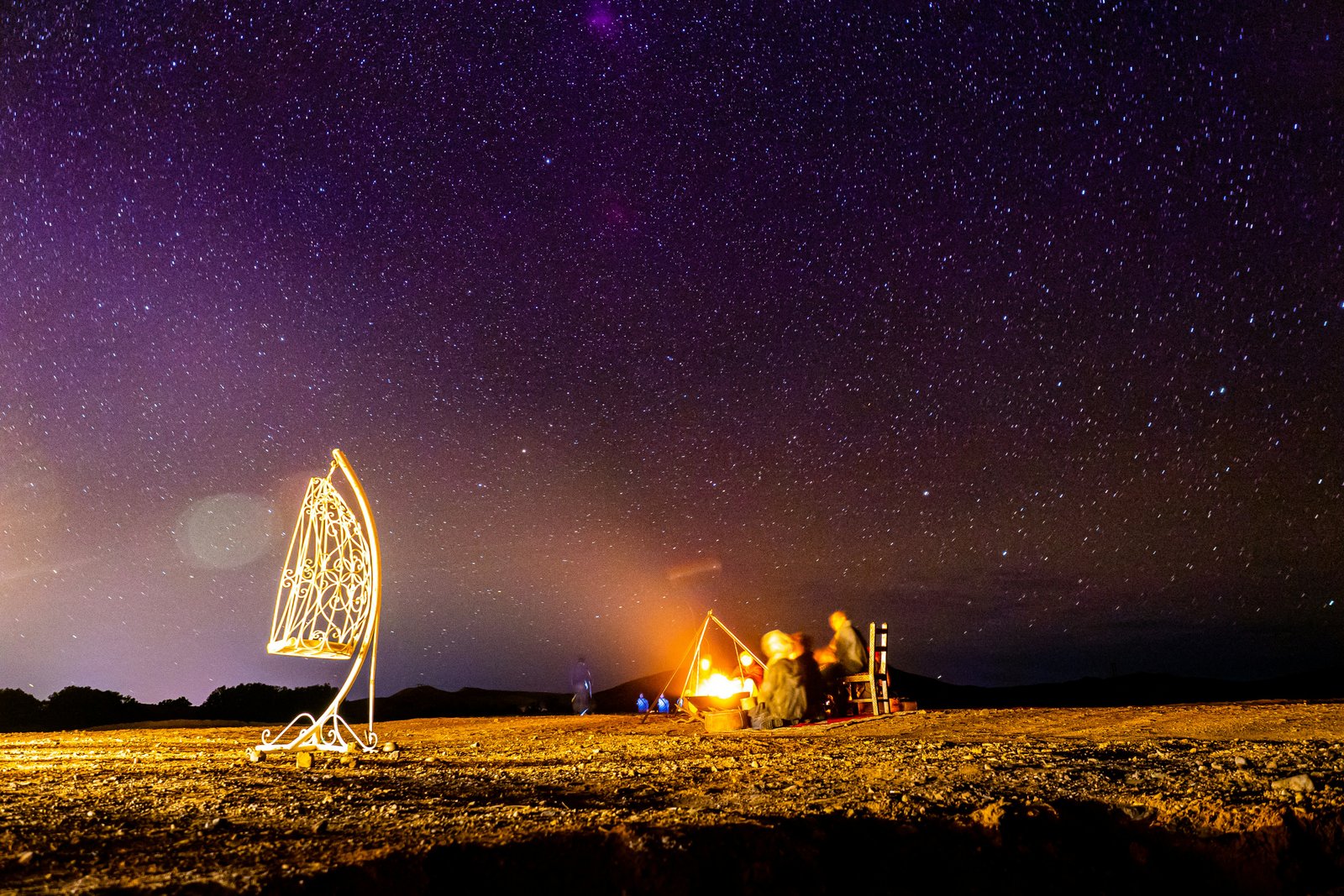 Luxury desert camp illuminated at night